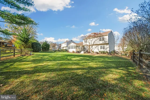 a view of a house with a big yard