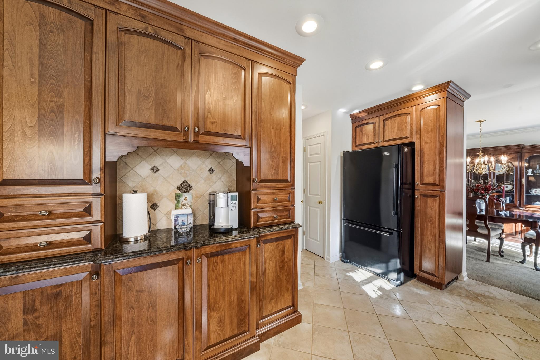 20 Allenhurst Court Gaithersburg, MD 20878 - Photo 19 of 57 a kitchen with stainless steel appliances granite countertop a refrigerator and a sink