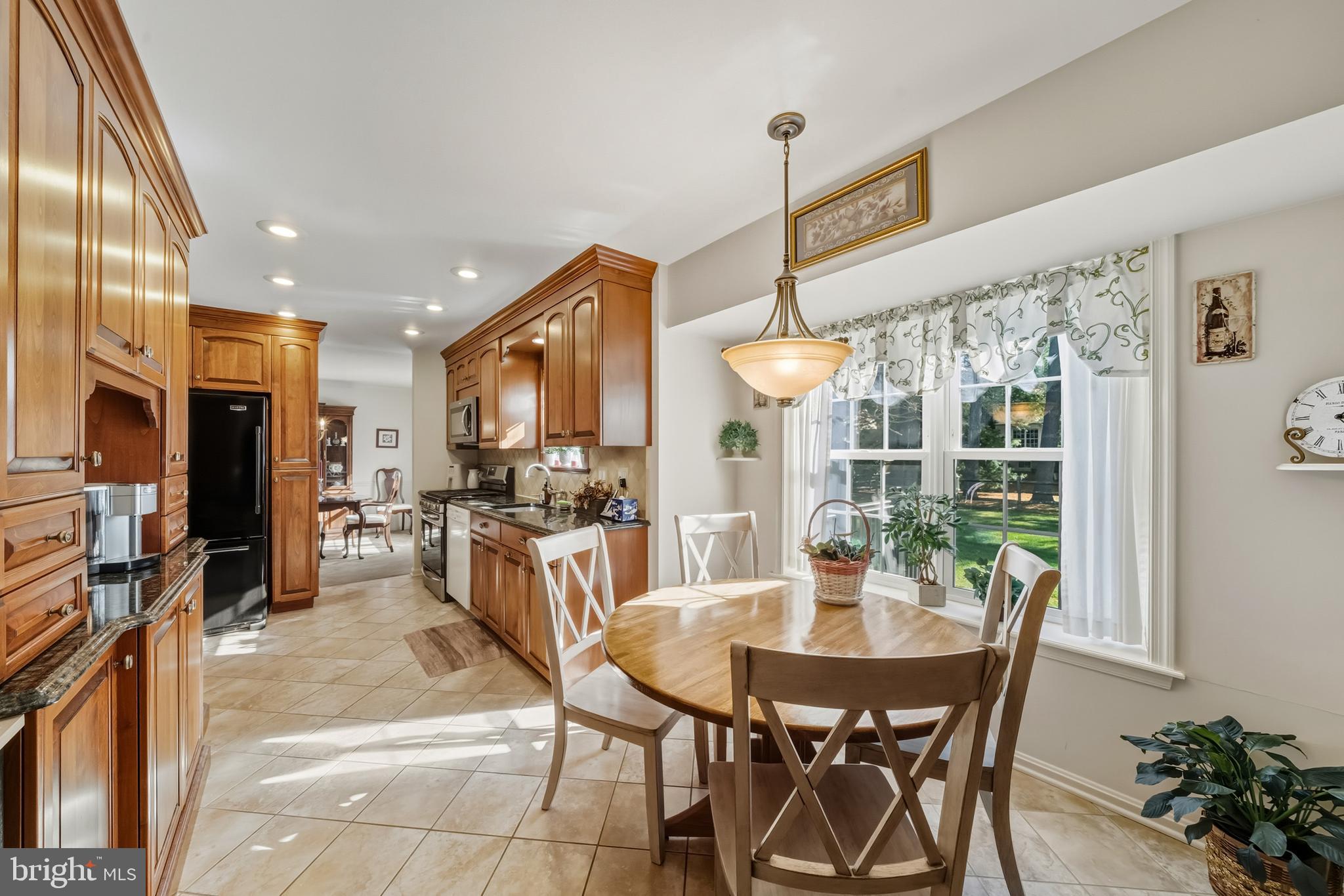 20 Allenhurst Court Gaithersburg, MD 20878 - Photo 23 of 57 a view of a dining room with furniture window and outside view