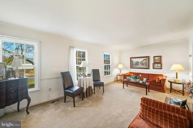 a view of a workspace with furniture and toys