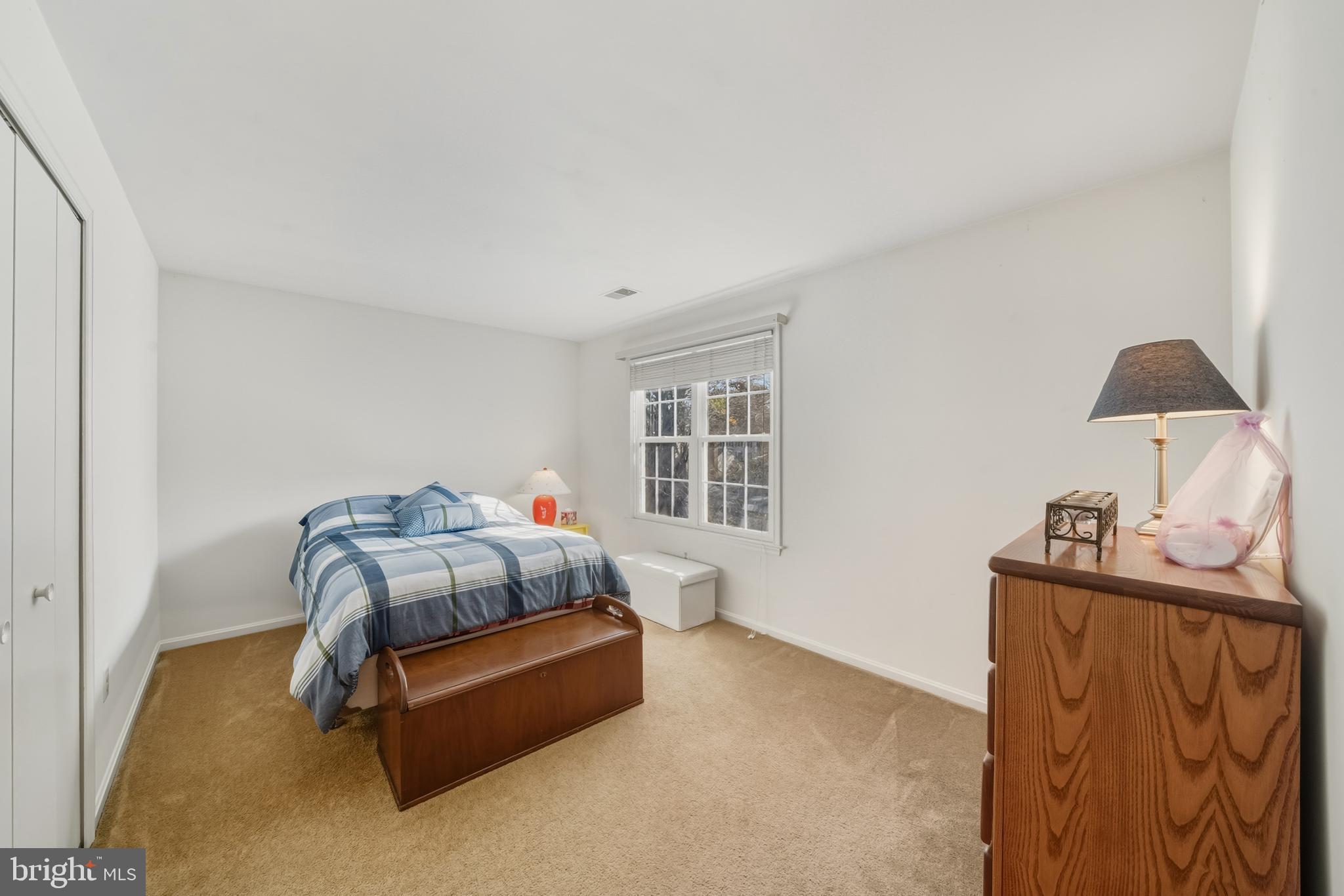 20 Allenhurst Court Gaithersburg, MD 20878 - Photo 43 of 57 a bedroom with a bed and a window