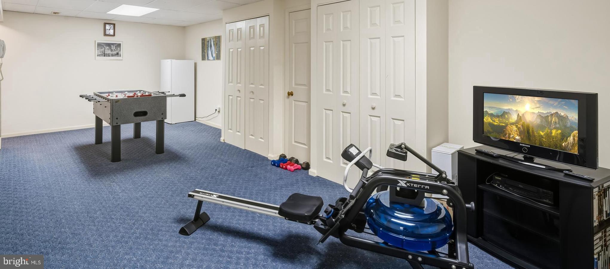 20 Allenhurst Court Gaithersburg, MD 20878 - Photo 47 of 57 a living room with furniture and a flat screen tv