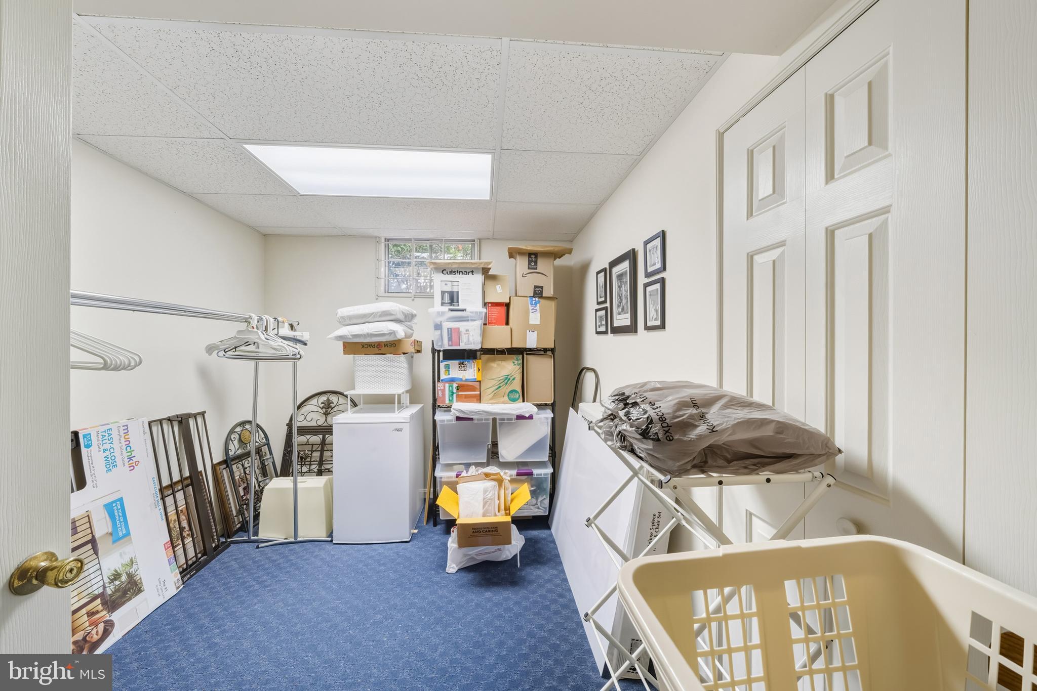 20 Allenhurst Court Gaithersburg, MD 20878 - Photo 50 of 57 a gym room with furniture and a flat screen tv