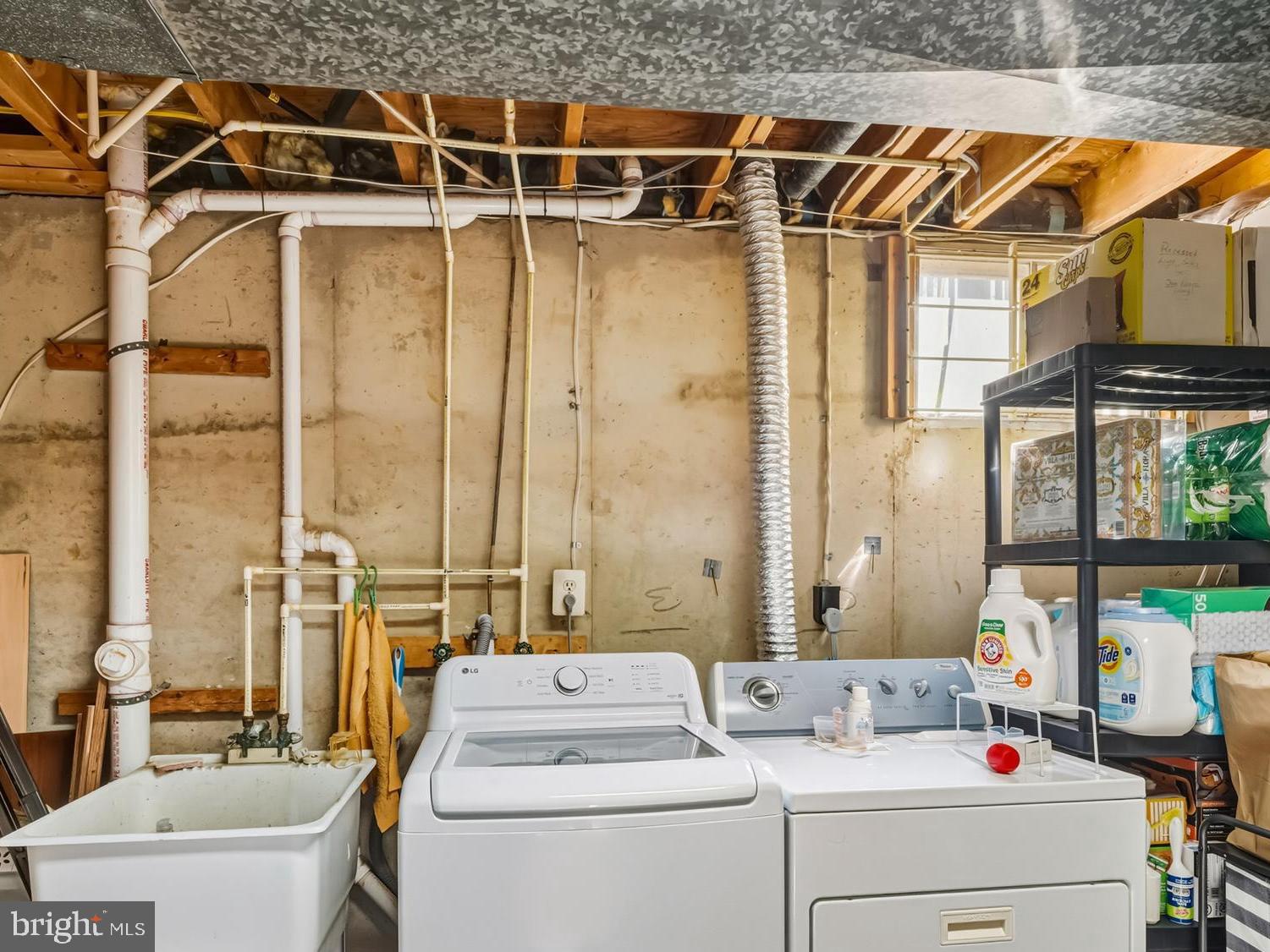 20 Allenhurst Court Gaithersburg, MD 20878 - Photo 51 of 57 a utility room with a large window and furniture