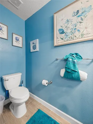 a bathroom with a toilet