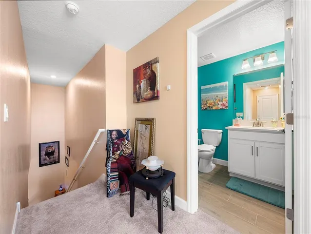 a view of a livingroom with furniture and window