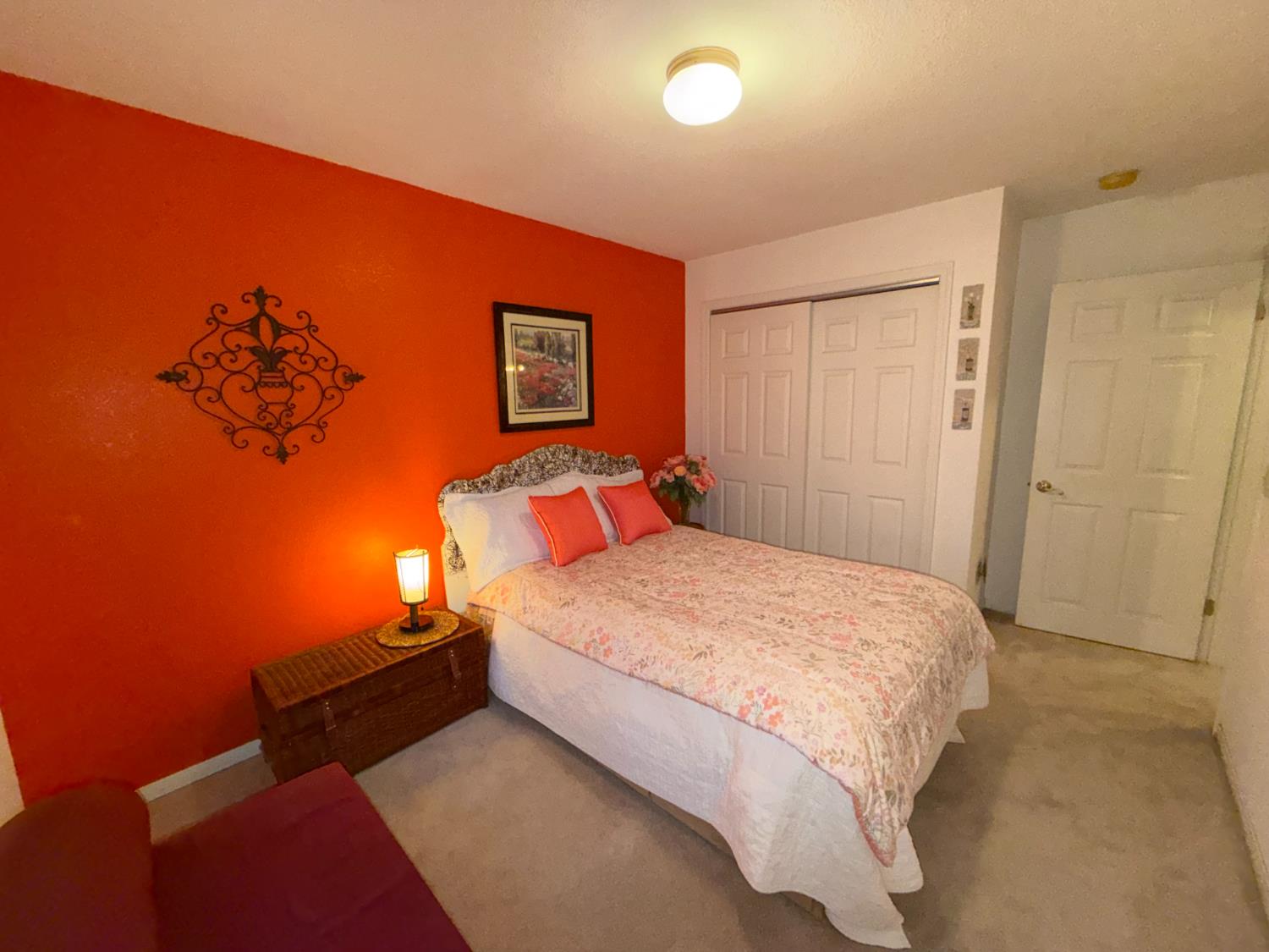645 Rigby Lane Applegate, CA 95703 - Photo 37 of 52 a bedroom with a bed and a painting on the wall