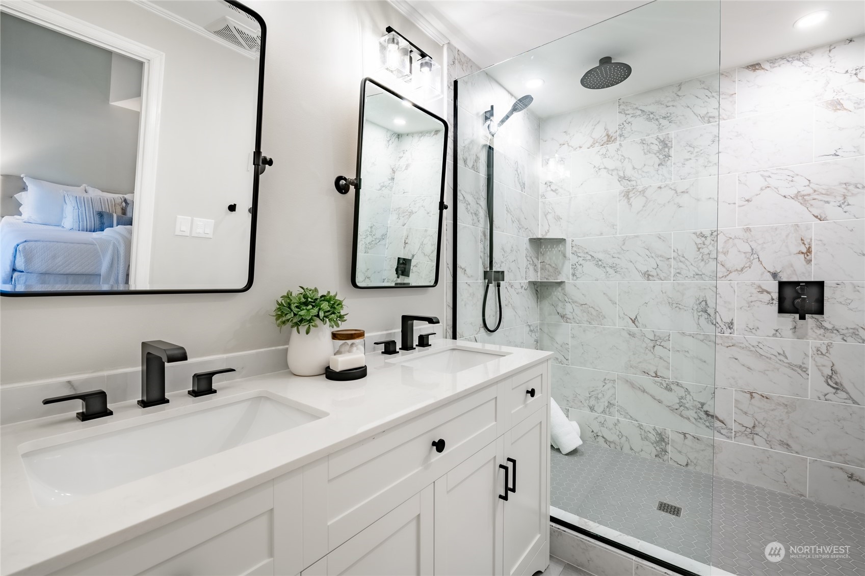 624 Clark Road Bellingham, WA 98225 - Photo 20 of 40 a bathroom with a sink a potted plant and shower