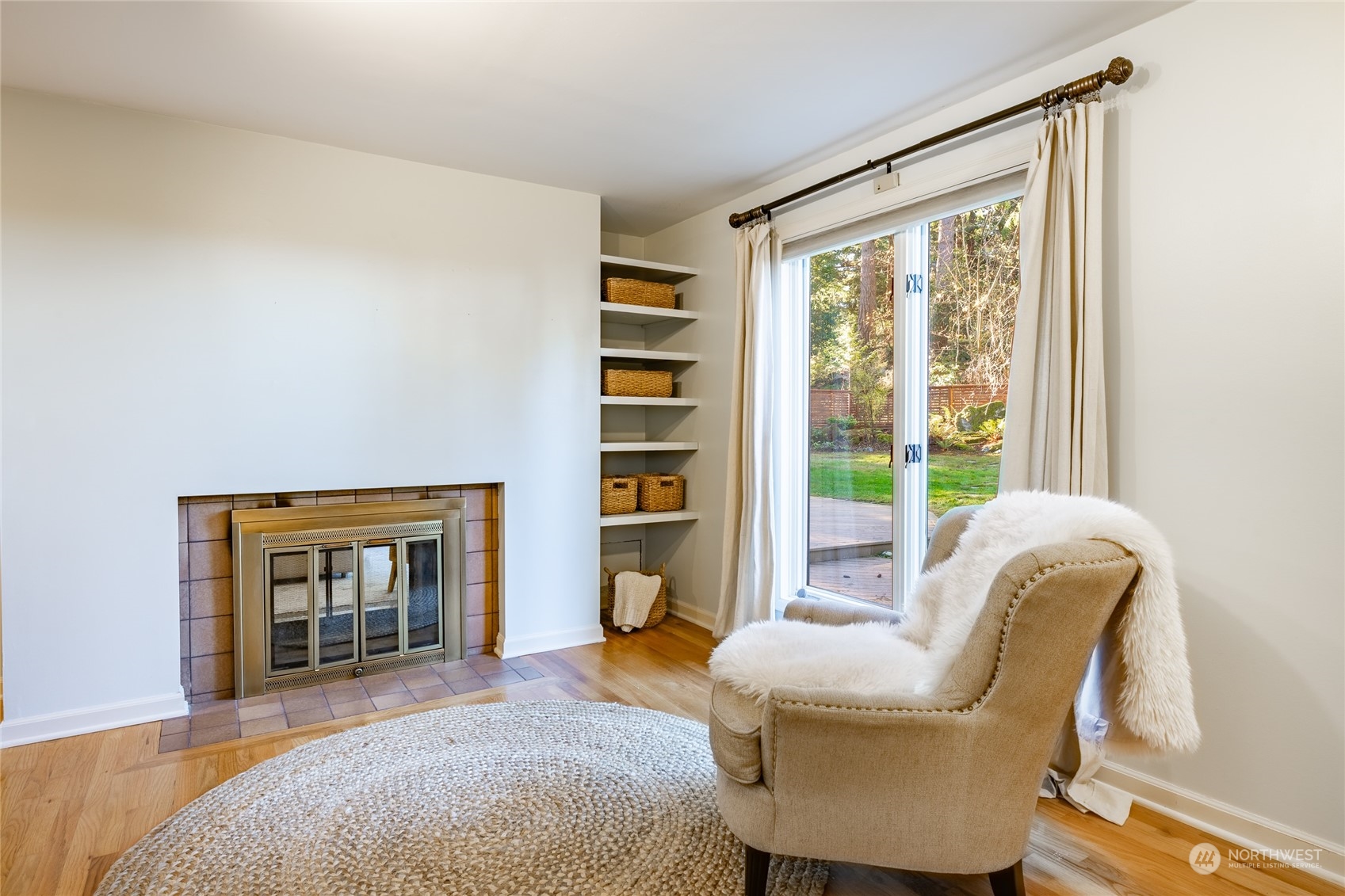 624 Clark Road Bellingham, WA 98225 - Photo 23 of 40 a living room with furniture and a fireplace