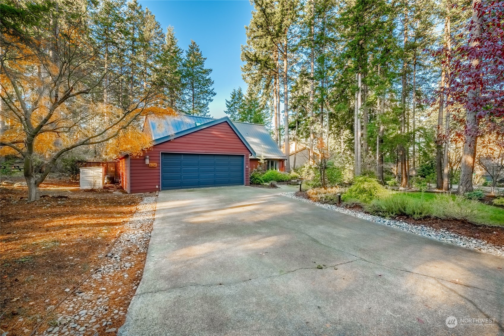 624 Clark Road Bellingham, WA 98225 - Photo 34 of 40 a front view of a house with a yard and garage