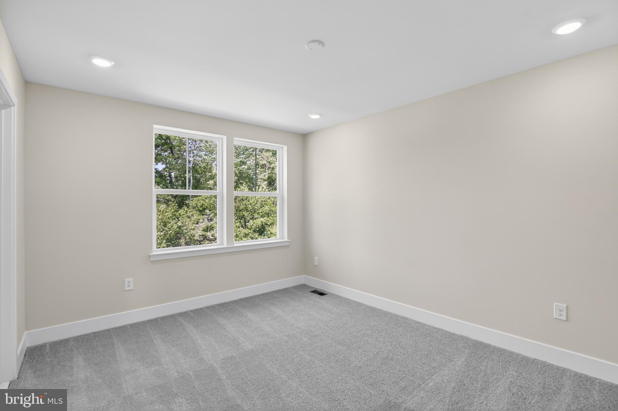 331 Hackley Drive Joppa, MD 21085 - Photo 14 of 18 an empty room with windows