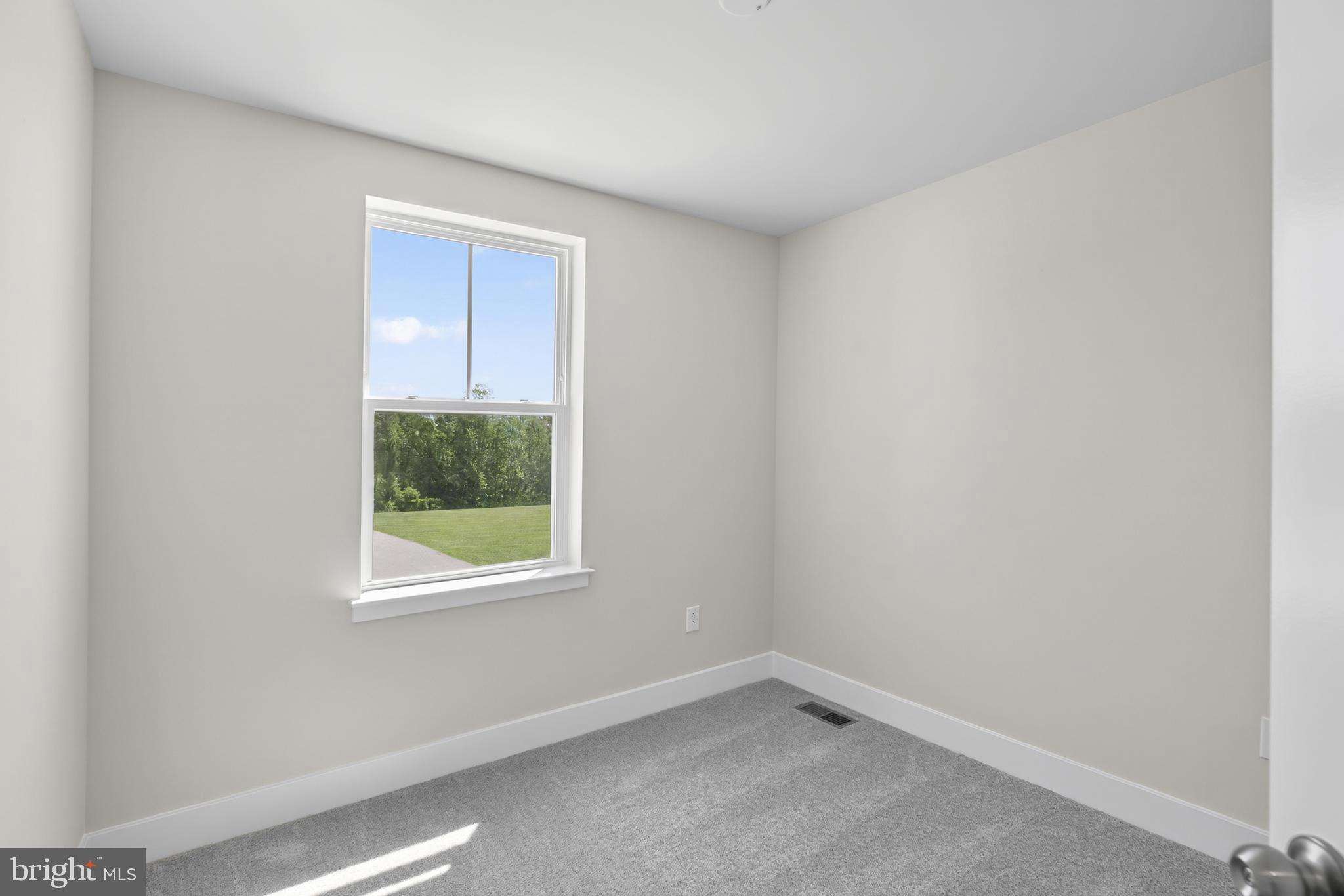 331 Hackley Drive Joppa, MD 21085 - Photo 15 of 18 an empty room with a window