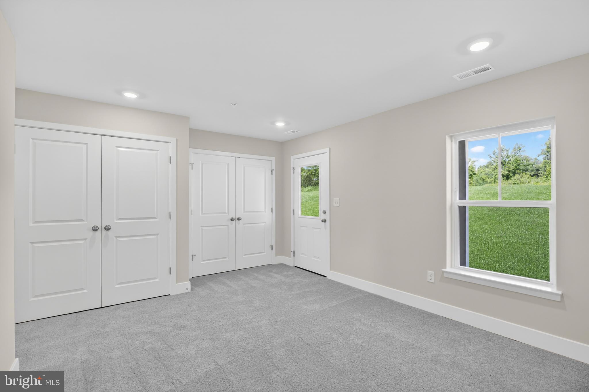 331 Hackley Drive Joppa, MD 21085 - Photo 2 of 18 a view of an empty room with a window