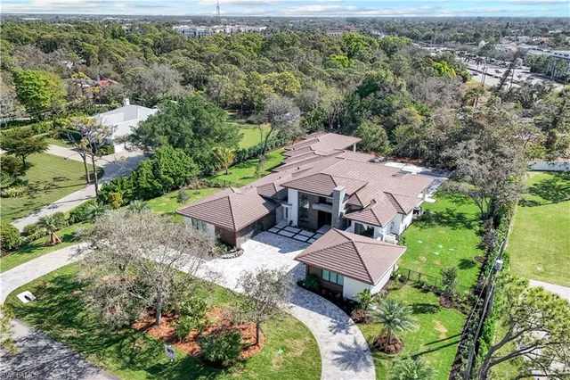 an aerial view of a house with a garden