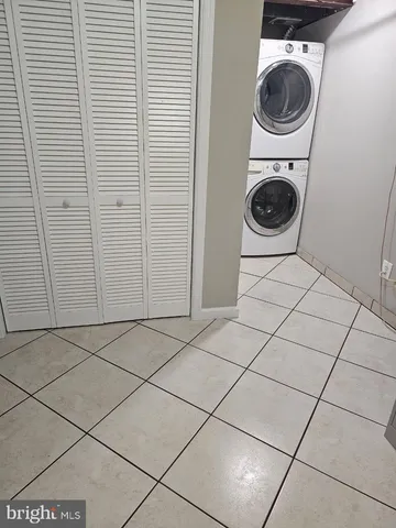 a view of a storage & utility room with washer and dryer