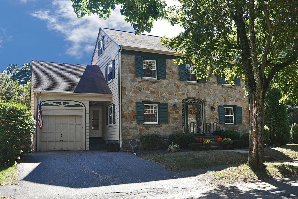 90 Martin Road Milton, MA 02186 - Photo 1 of 17 front view of a house with a yard