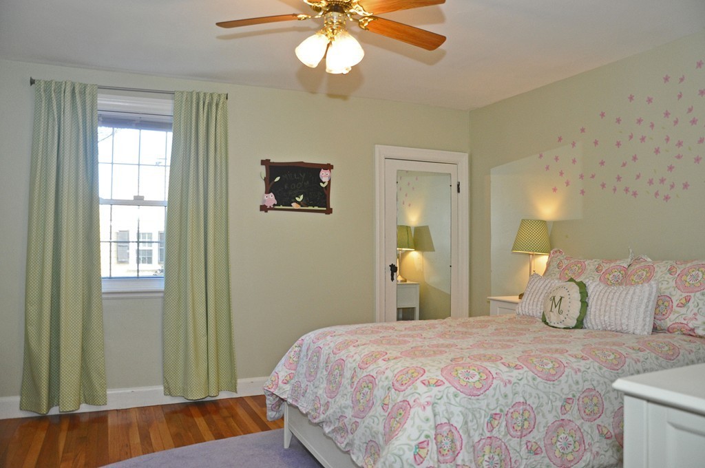 90 Martin Road Milton, MA 02186 - Photo 11 of 17 a bedroom with a bed and a window