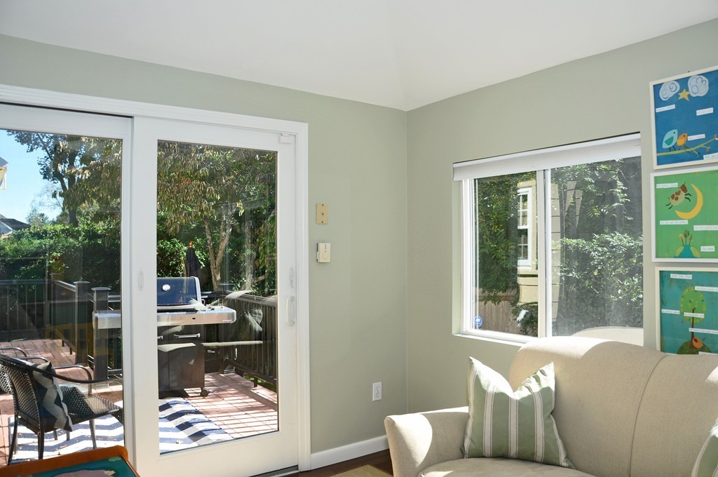 90 Martin Road Milton, MA 02186 - Photo 8 of 17 a living room with furniture and a floor to ceiling window