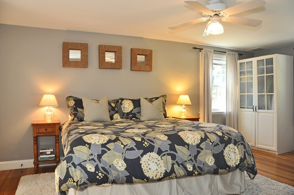90 Martin Road Milton, MA 02186 - Photo 9 of 17 a bedroom with a bed and a window