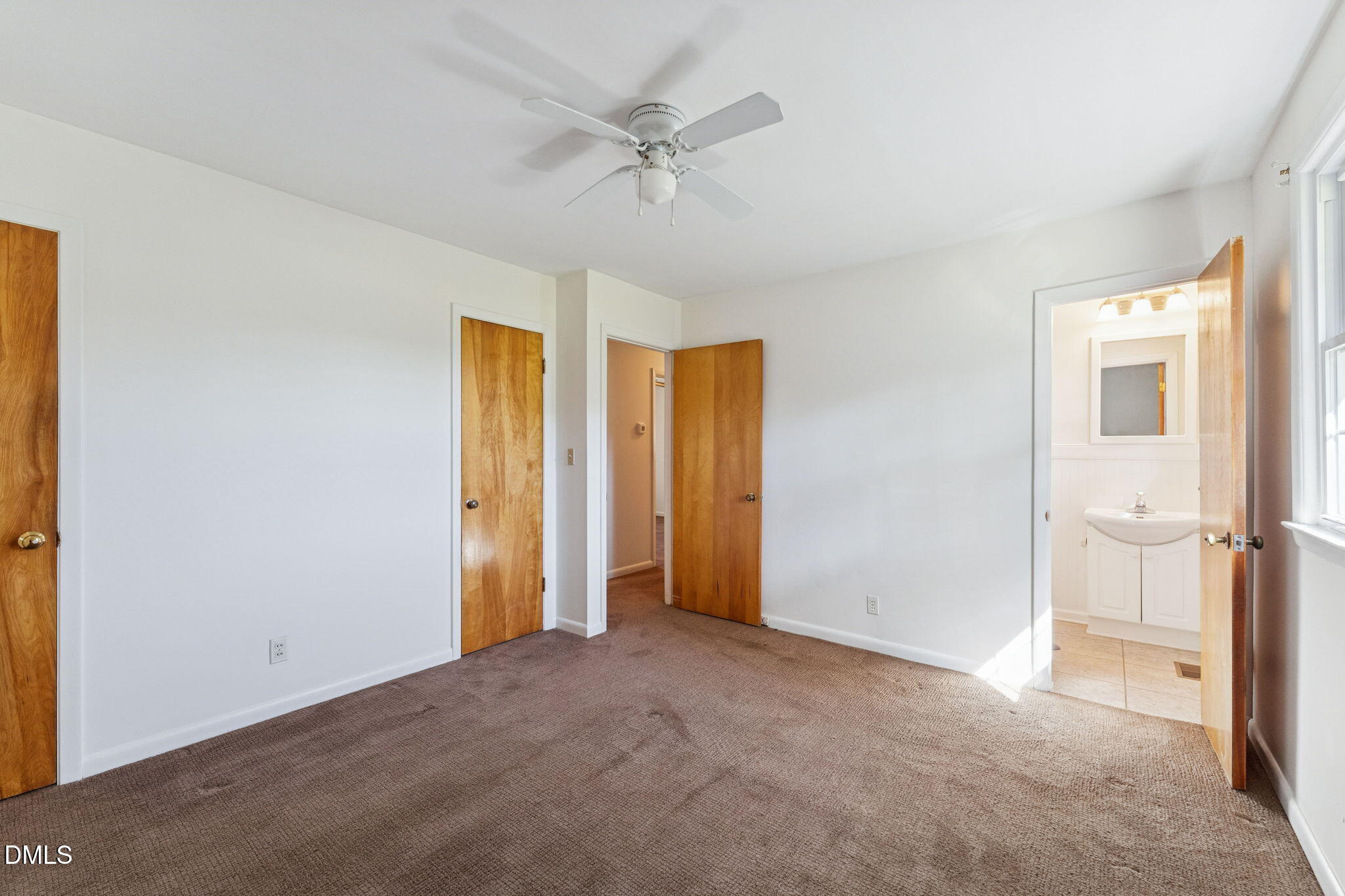 149 Fairview Village Road Dunn, NC 28334 - Photo 13 of 22 a view of an empty room with a window