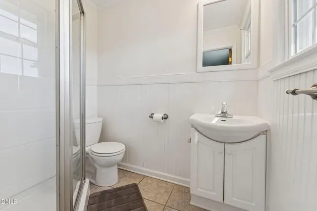 a bathroom with a sink and a toilet