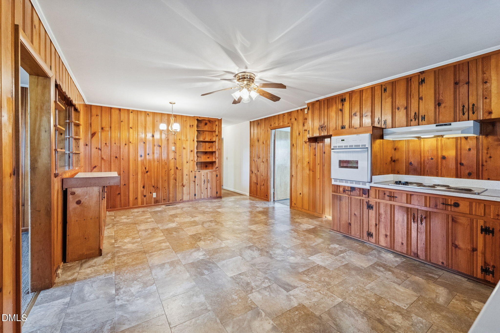 149 Fairview Village Road Dunn, NC 28334 - Photo 19 of 22 a view of a kitchen with furniture and a window