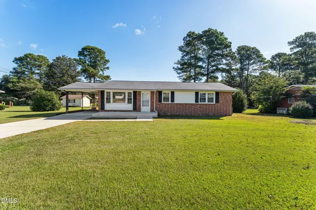 a view of a house with a swimming pool