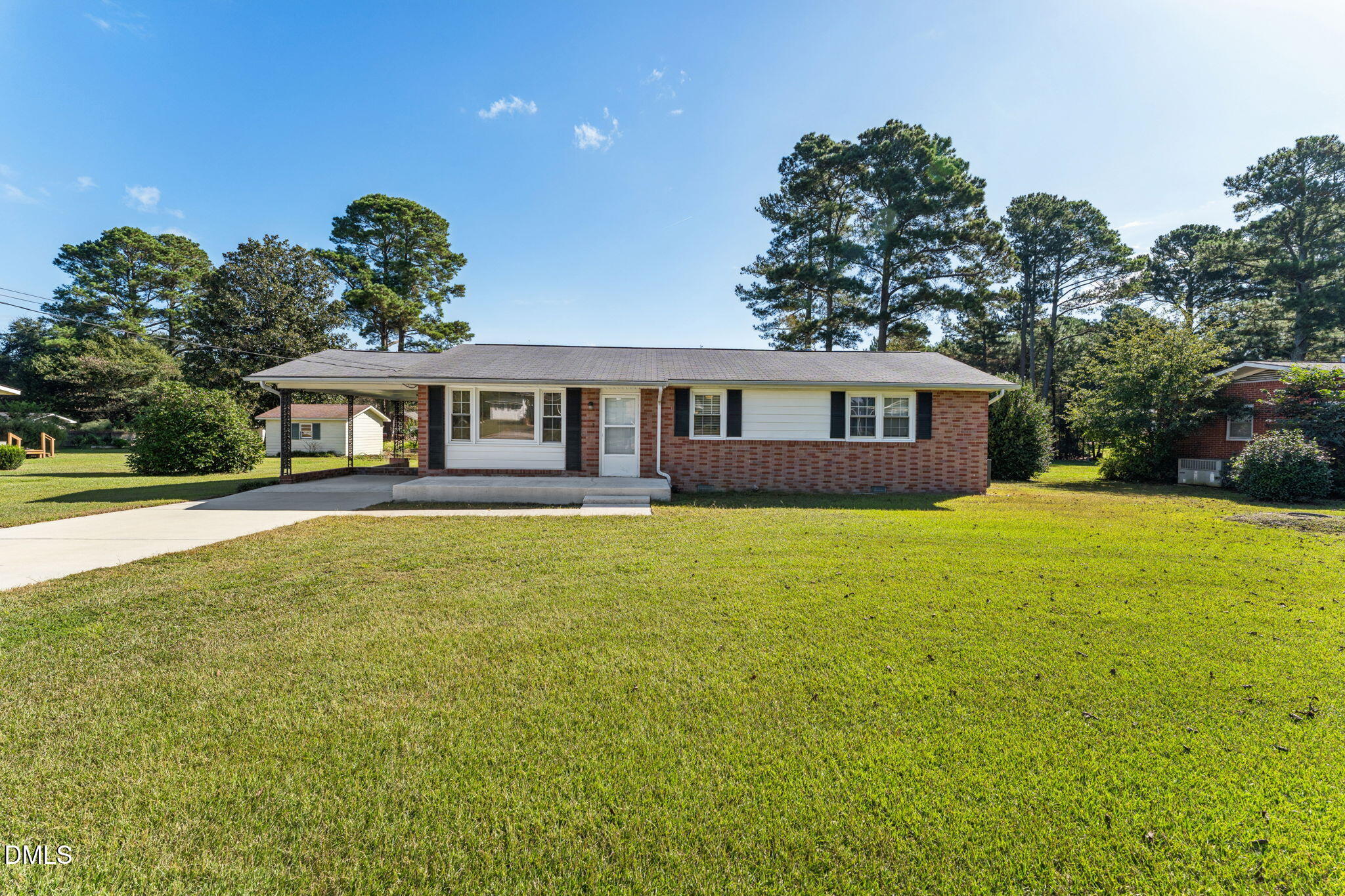 149 Fairview Village Road Dunn, NC 28334 - Photo 2 of 22 a view of a house with a swimming pool