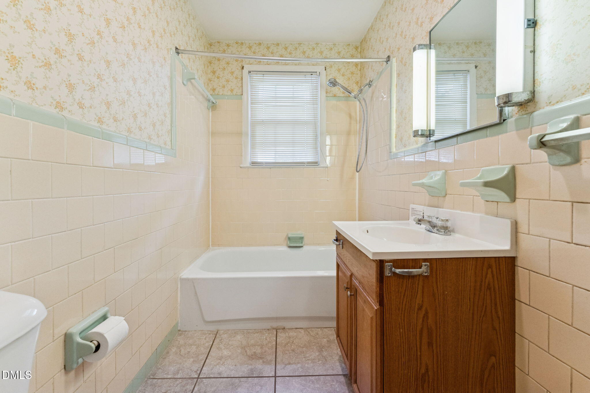 149 Fairview Village Road Dunn, NC 28334 - Photo 9 of 22 a bathroom with a sink a toilet and shower