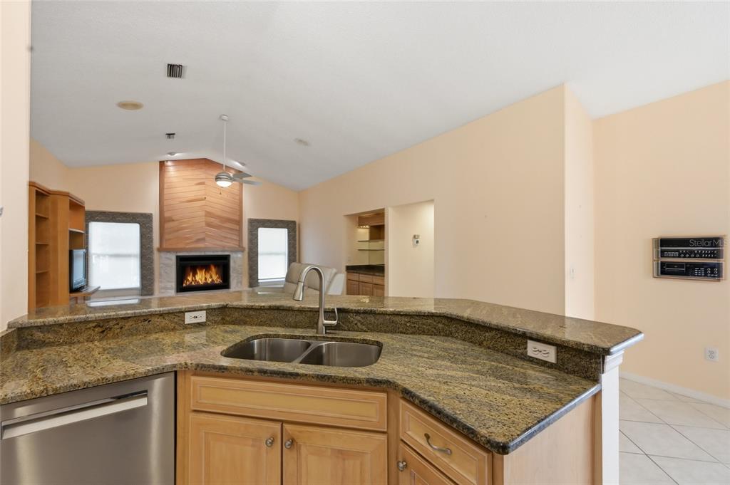3732 Surrey Lane Sarasota, FL 34235 - Photo 16 of 35 a kitchen with a sink and cabinets