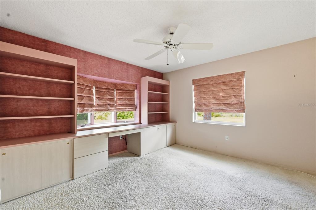 3732 Surrey Lane Sarasota, FL 34235 - Photo 21 of 35 a view of an empty room with a window