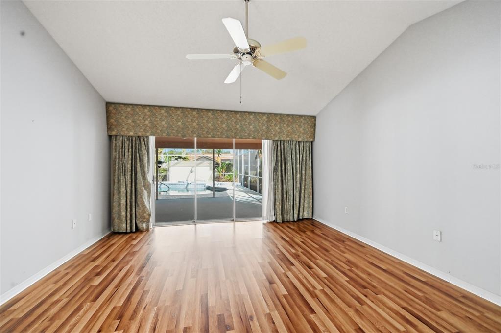 3732 Surrey Lane Sarasota, FL 34235 - Photo 24 of 35 wooden floor in a hall with an entryway