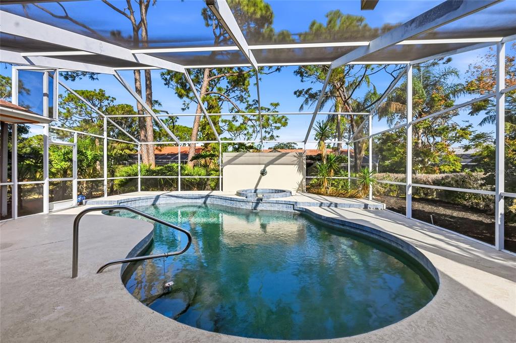 3732 Surrey Lane Sarasota, FL 34235 - Photo 32 of 35 a view of a swimming pool with a yard from a balcony