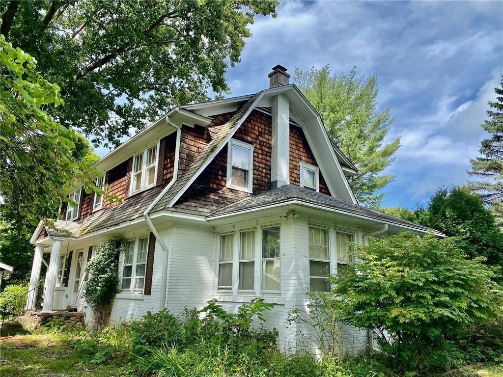 1828 Manchester Road Erie, PA 16505 - Photo 2 of 2 a front view of a house with a yard