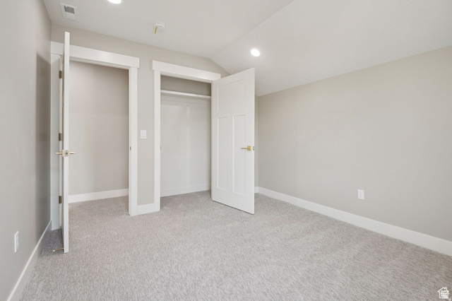 1471 Colbey Loop Santa Clara, UT 84765 - Photo 13 of 45 Bright interior space featuring light gray carpeting, neutral wall finishes, and white trim