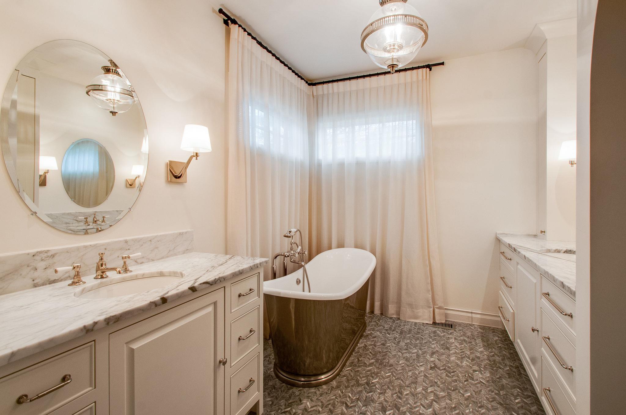 232 Cherokee Road Nashville, TN 37205 - Photo 13 of 24 a bathroom with a double vanity sink and a mirror