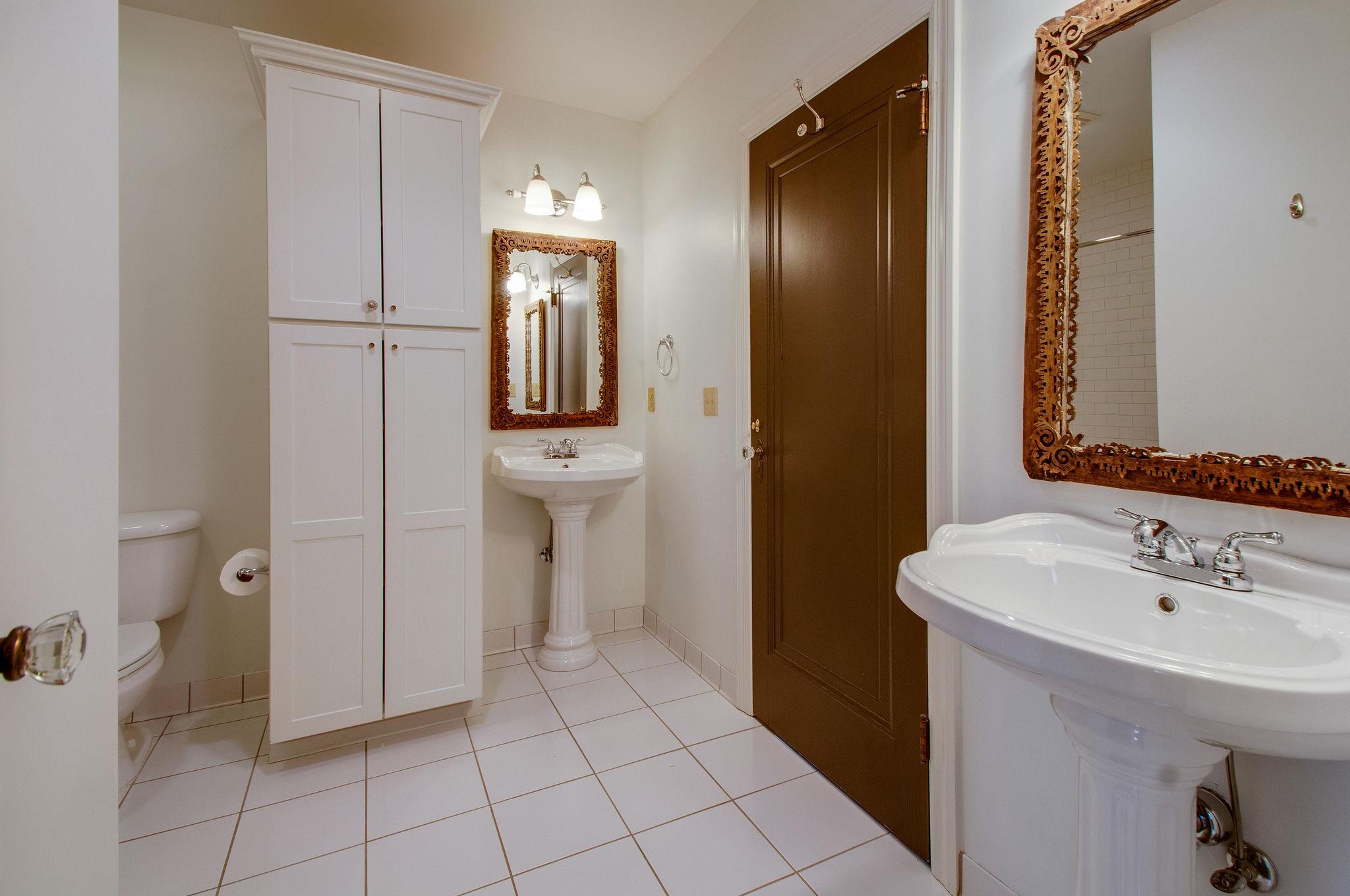 232 Cherokee Road Nashville, TN 37205 - Photo 18 of 24 a spacious bathroom with a sink a toilet and shower