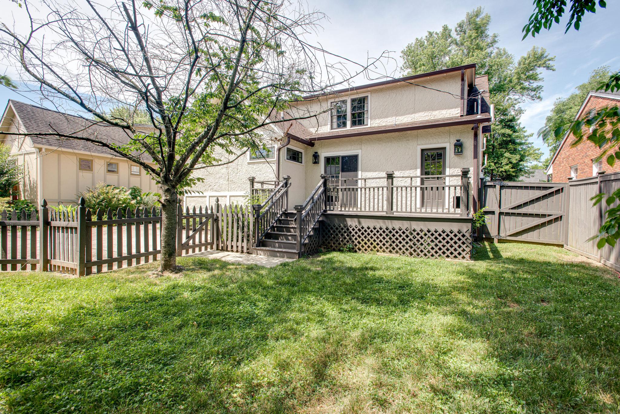 232 Cherokee Road Nashville, TN 37205 - Photo 23 of 24 a view of a house with a yard