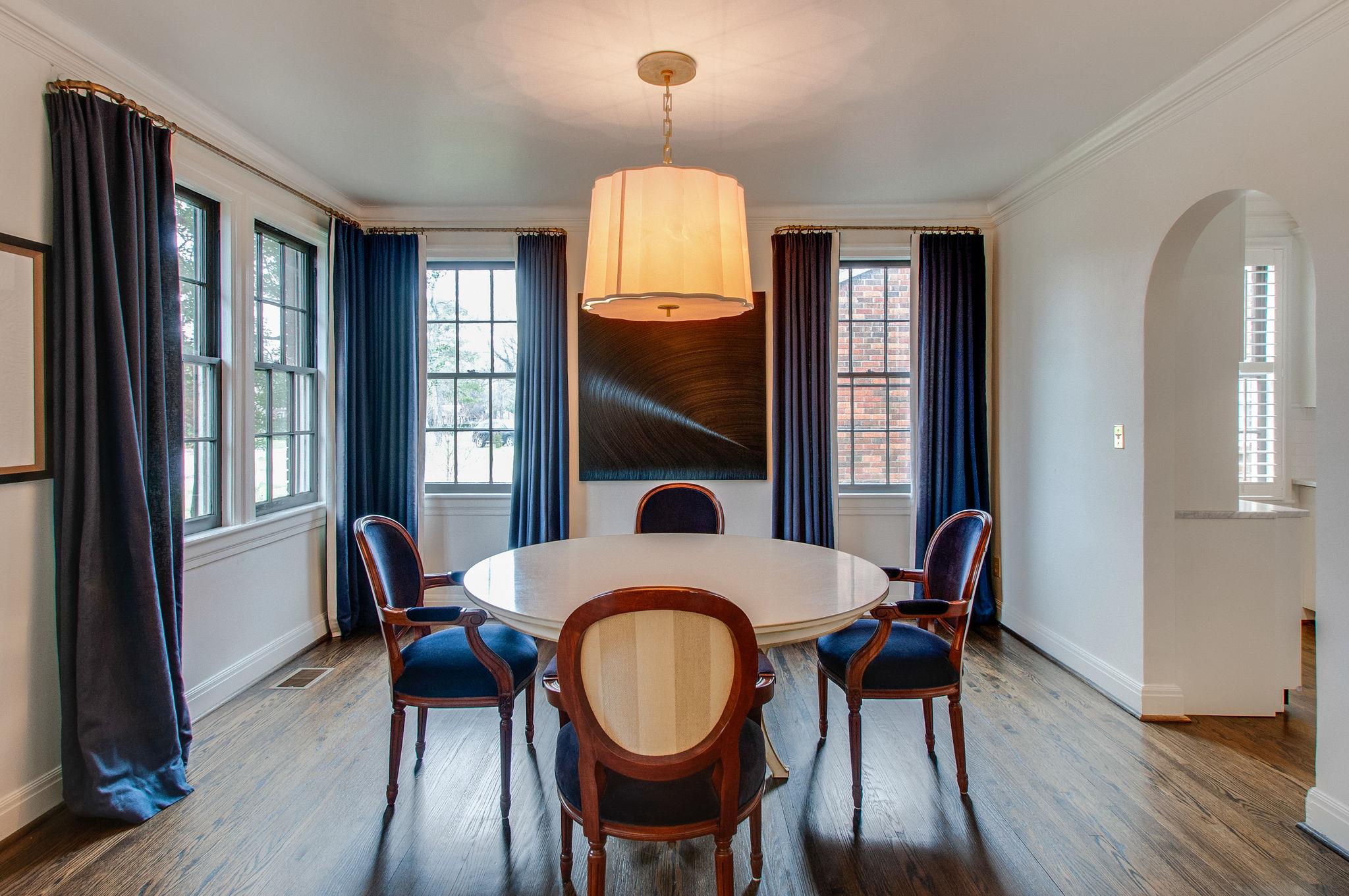 232 Cherokee Road Nashville, TN 37205 - Photo 4 of 24 a dining room with furniture window and wooden floor