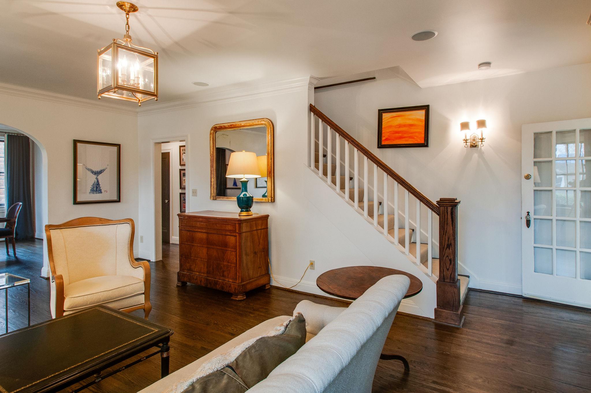 232 Cherokee Road Nashville, TN 37205 - Photo 5 of 24 a view of livingroom and dining room with wooden floor
