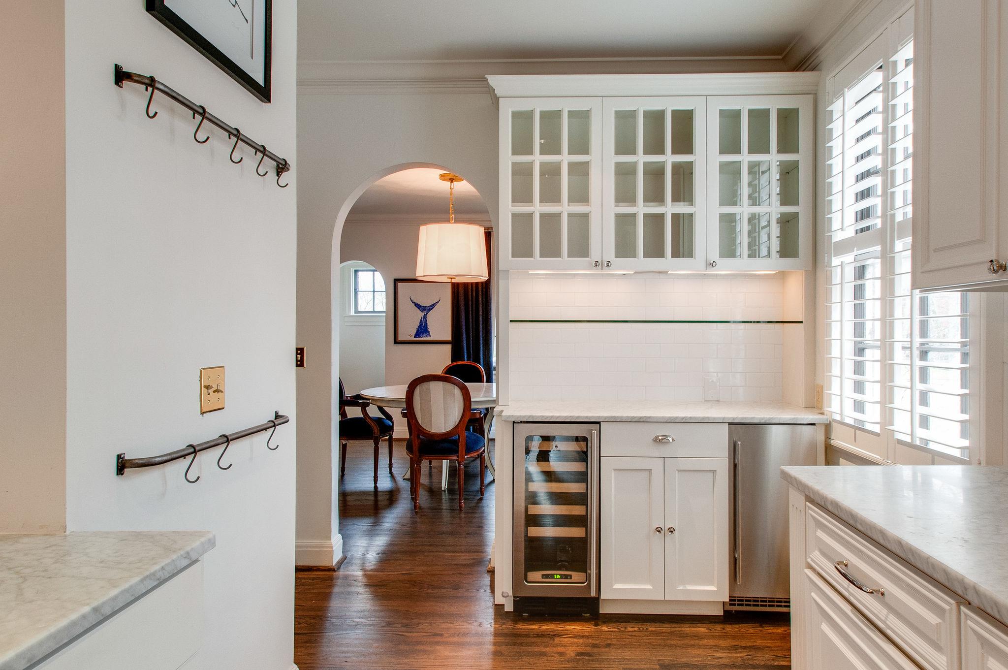232 Cherokee Road Nashville, TN 37205 - Photo 7 of 24 an entryway with wooden floor and windows