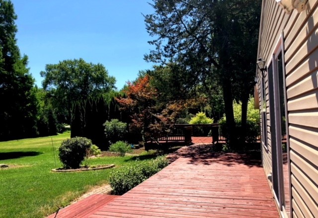 5 Oakwood Road Indian Creek, IL 60061 - Photo 11 of 18 a view of a backyard with sitting area