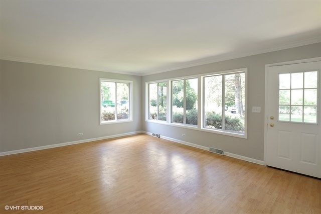 5 Oakwood Road Indian Creek, IL 60061 - Photo 2 of 18 a view of an empty room with a window