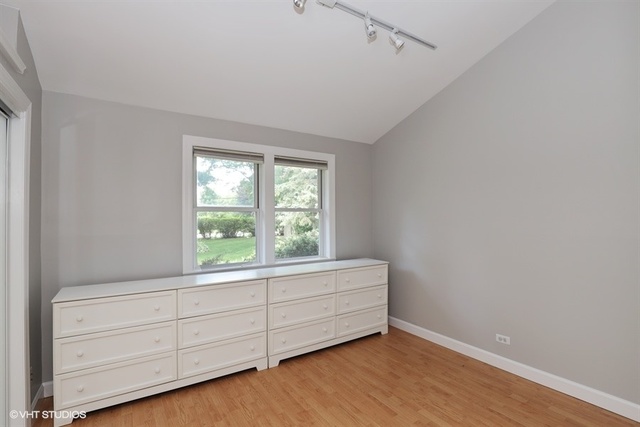 5 Oakwood Road Indian Creek, IL 60061 - Photo 6 of 18 a room with a window in it