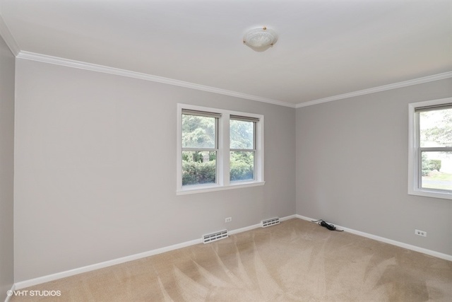 5 Oakwood Road Indian Creek, IL 60061 - Photo 7 of 18 a view of an empty room with a window