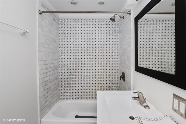 5 Oakwood Road Indian Creek, IL 60061 - Photo 9 of 18 a bathroom with a bathtub and shower