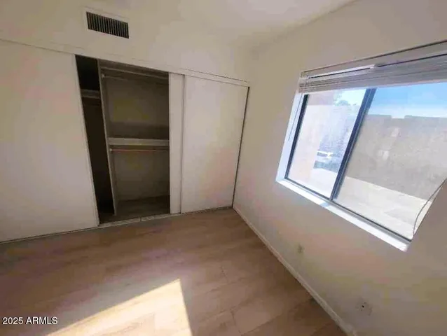 a view of empty room with front door