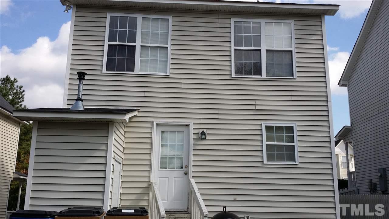 4917 Windsprint Way Raleigh, NC 27616 - Photo 2 of 13 a side view of a house