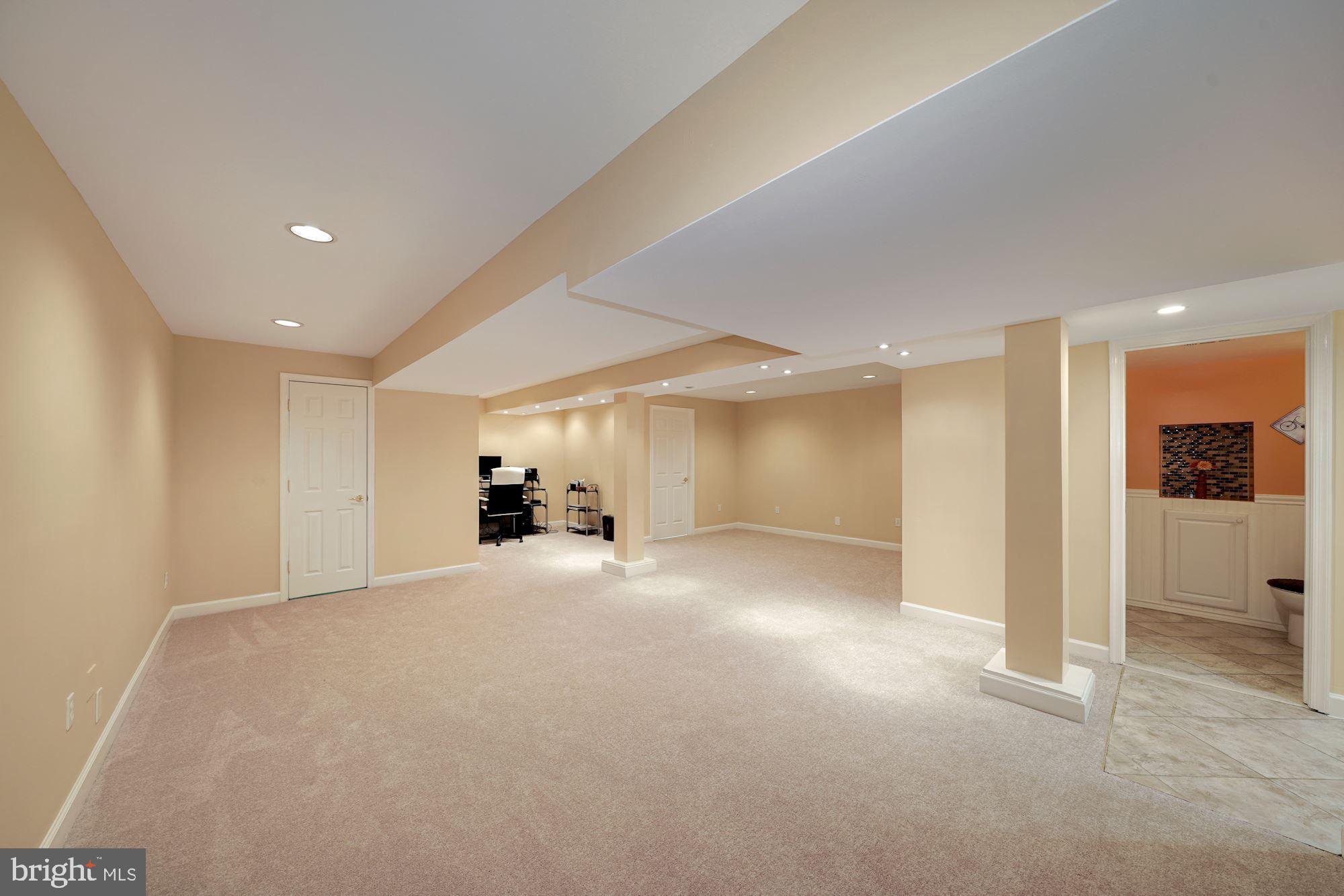 19300 Olney Mill Road Olney, MD 20832 - Photo 25 of 35 Basement rec room