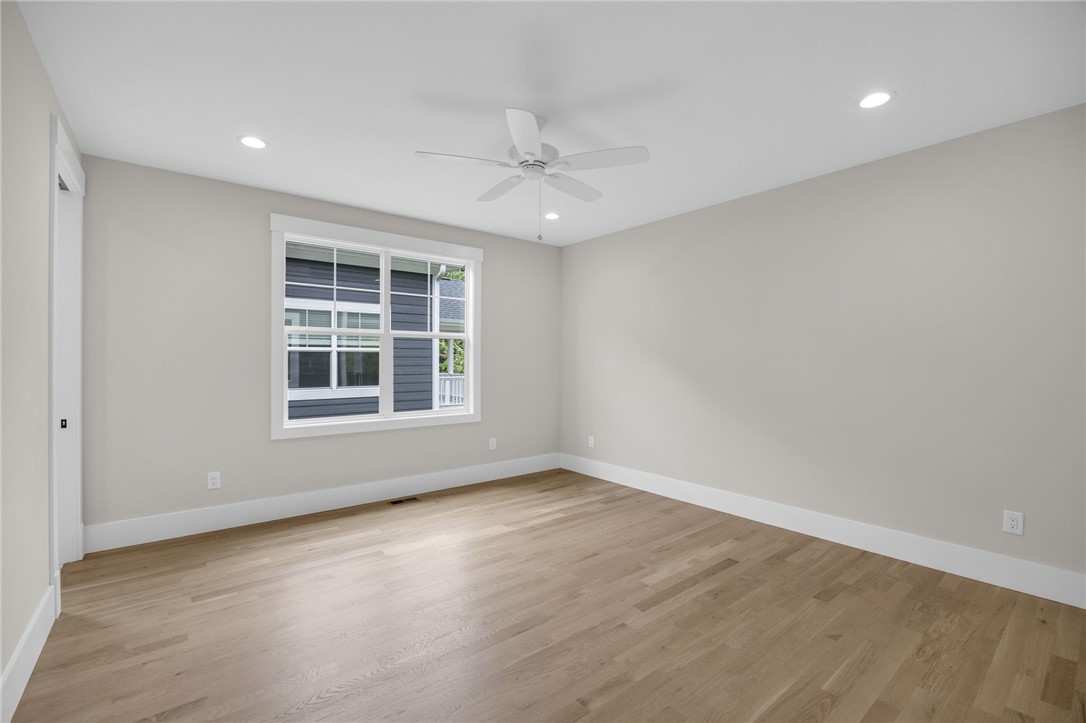1230 Melton Road, Unit 216 West Union, SC 29696 - Photo 21 of 49 Well-lit interior space features pristine wood flooring and a refreshing ceiling fan.